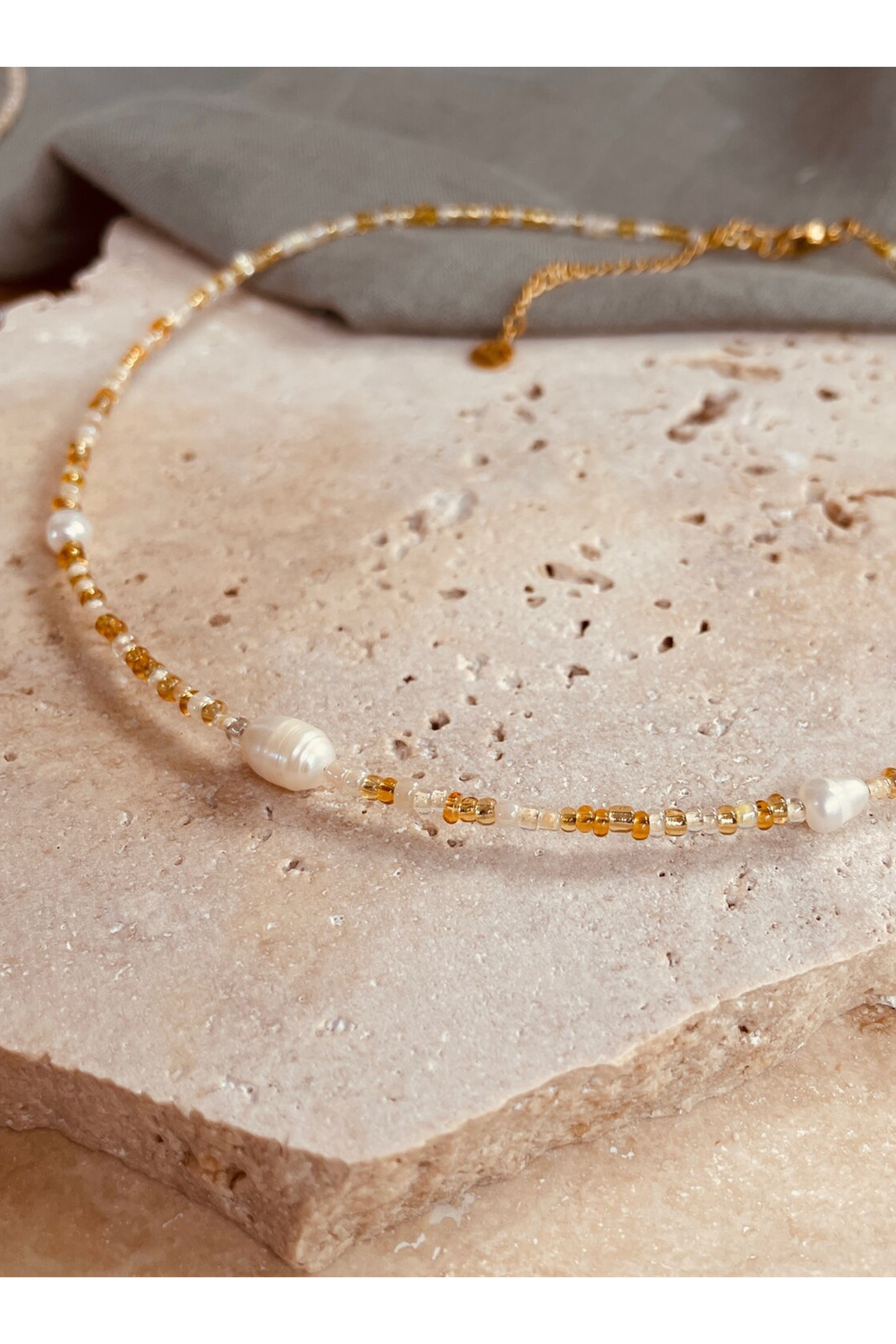 Exhale Necklace - Pebbly Beach Gold