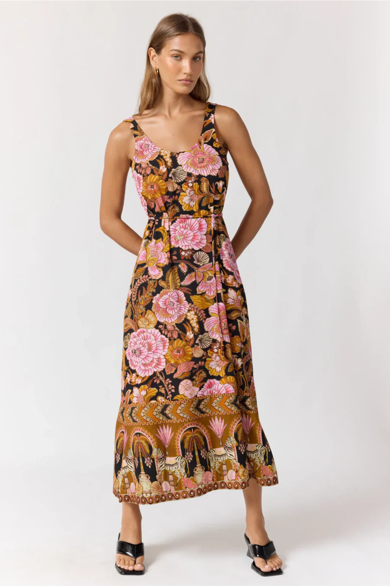 Woman wearing a floral dress on a white background