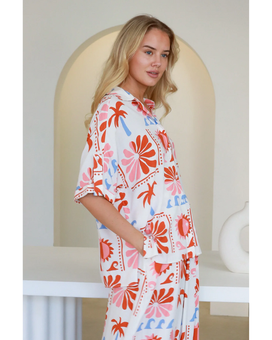 Model wearing Jill Shirt with colorful floral print, breathable fabric from My Store, styled in relaxed fit