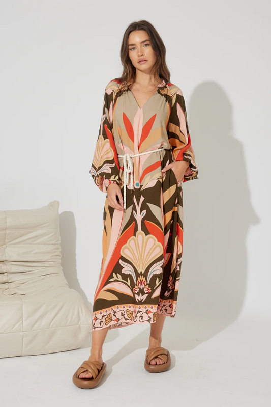 Koa Maxi Dress by Solara Boheme featuring a colorful floral pattern, v neck, rope tie belt, and practical pockets.
