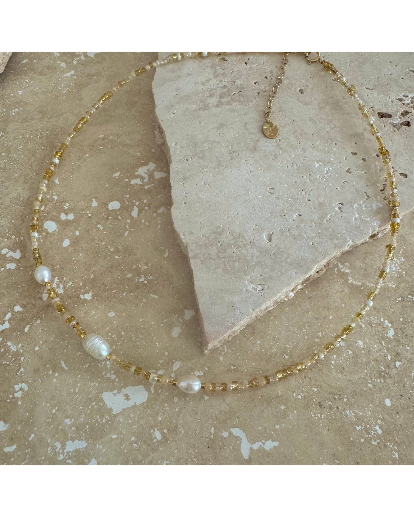 Exhale Necklace - Pebbly Beach Gold