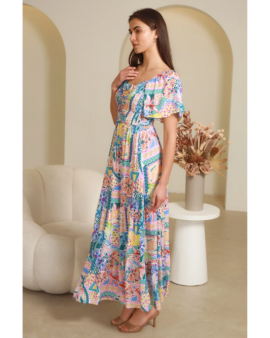Model wearing colorful Sharon Short Sleeves Maxi Dress from My Store with floral patterns and flowy design