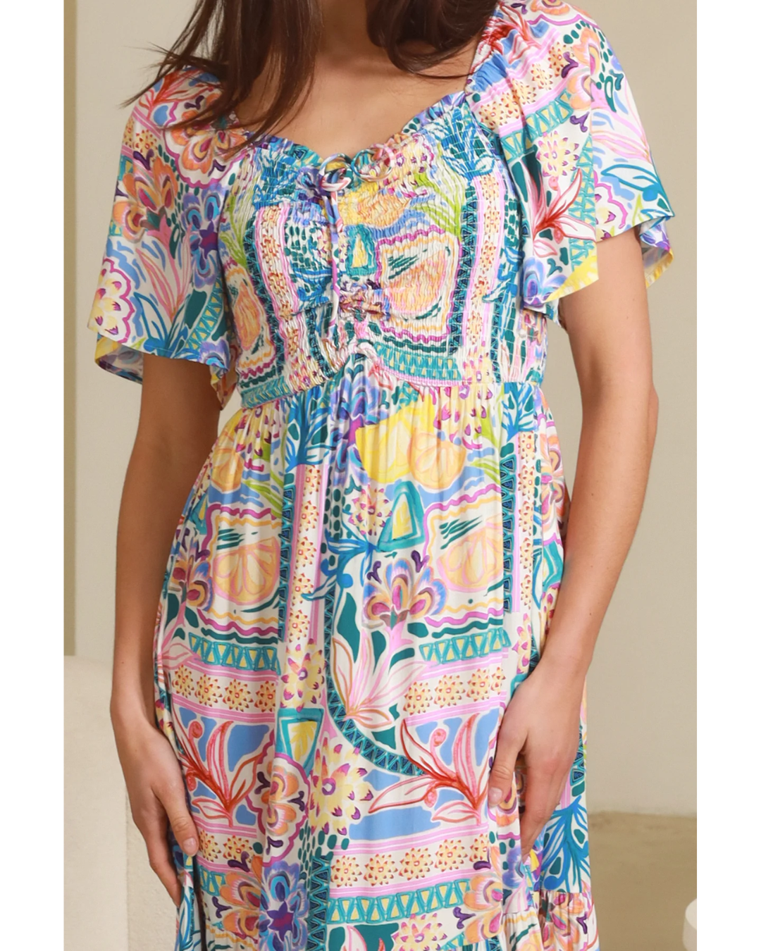 Sharon Short Sleeves Maxi Dress by My Store features vibrant patterns with a soft, breathable rayon fabric and short sleeves.