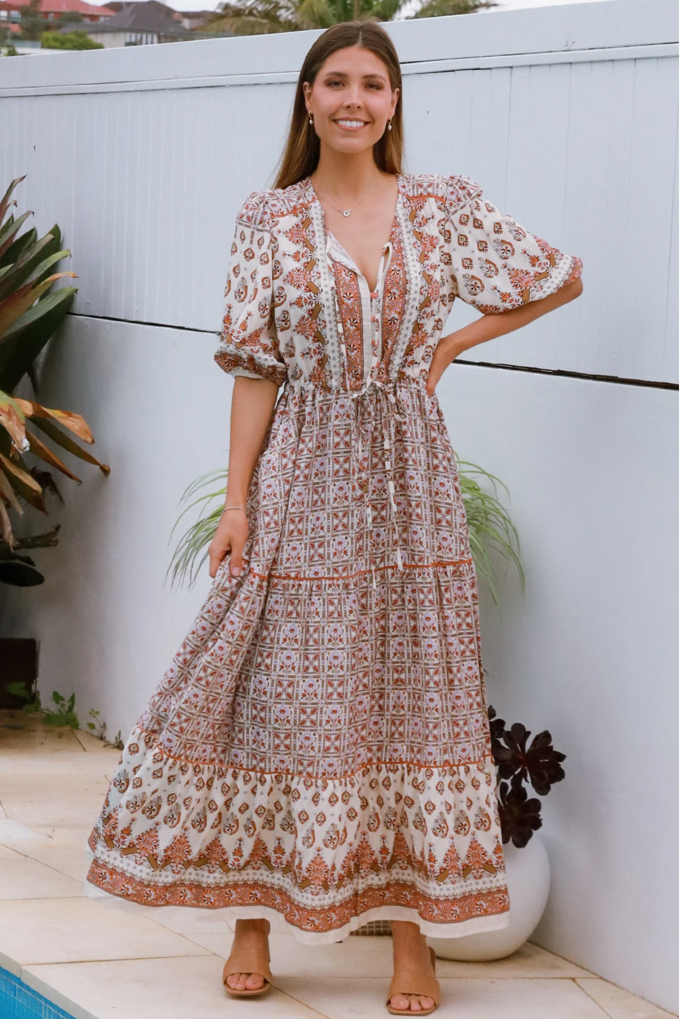 Woman wearing Solara Boheme Tori Maxi Dress in breathable rayon with unique vintage-inspired print outdoors